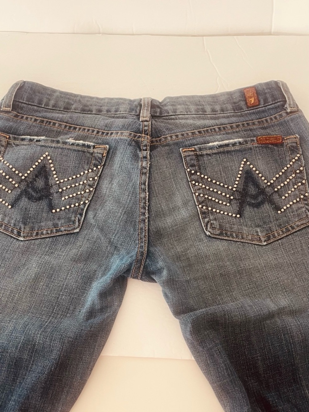 7 For All Mankind Vintage Blue Wash Bootcut Jeans with Studded Back Pockets